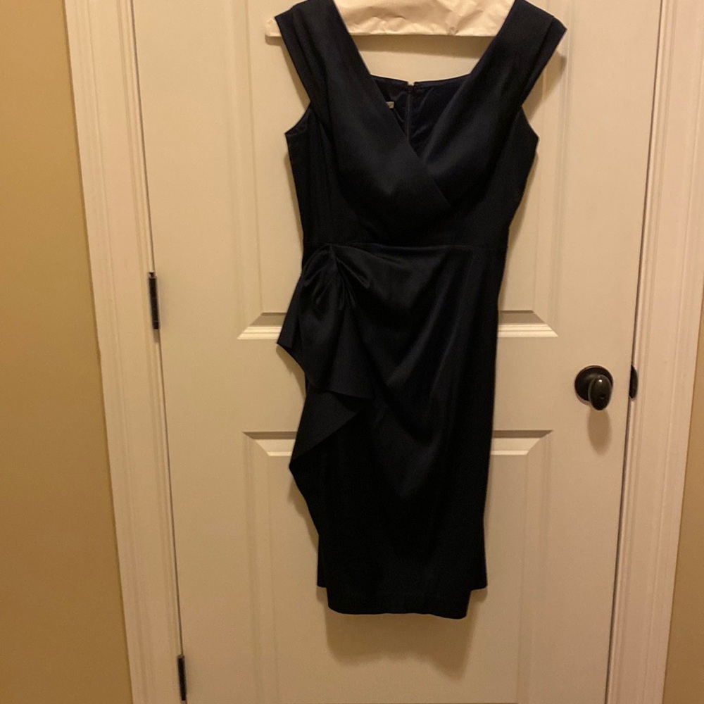 Maggie London cocktail dress. Size 10 runs small. Navy blue satin. Worn once.